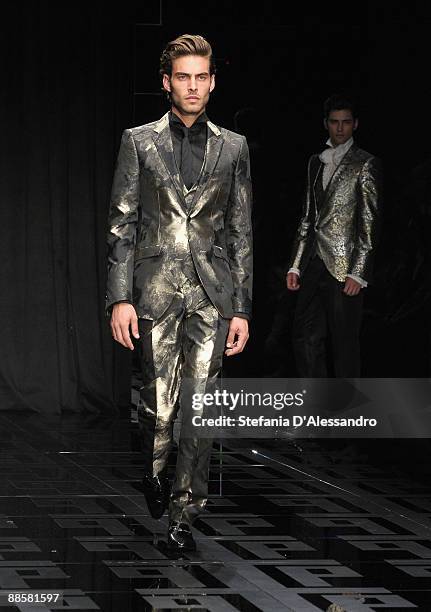 Model walks the runway during Carlo Pignatelli Cerimonia Fashion Show as part as Milan Fashion Week Menswear Spring/Summer 2010 on June 19, 2009 in...