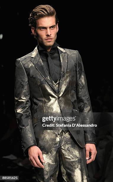 Model walks the runway during Carlo Pignatelli Cerimonia Fashion Show as part as Milan Fashion Week Menswear Spring/Summer 2010 on June 19, 2009 in...