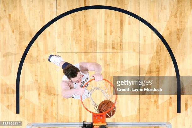 Omer Asik of the New Orleans Pelicans dunks against the Golden State Warriors on December 4, 2017 at Smoothie King Center in New Orleans, Louisiana....