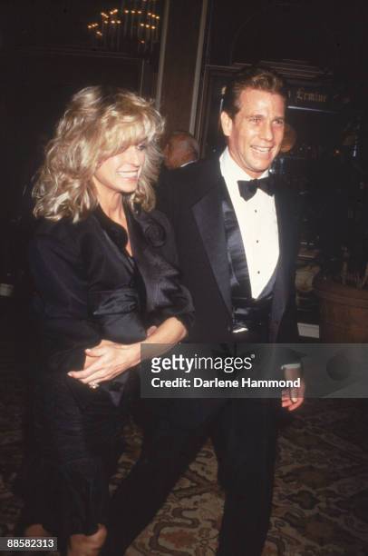 American acting couple Farrah Fawcett and Ryan O'Neal smile as they arrive at the Director's Guild Awards at the Beverly Hilton Hotel, Los Angeles,...