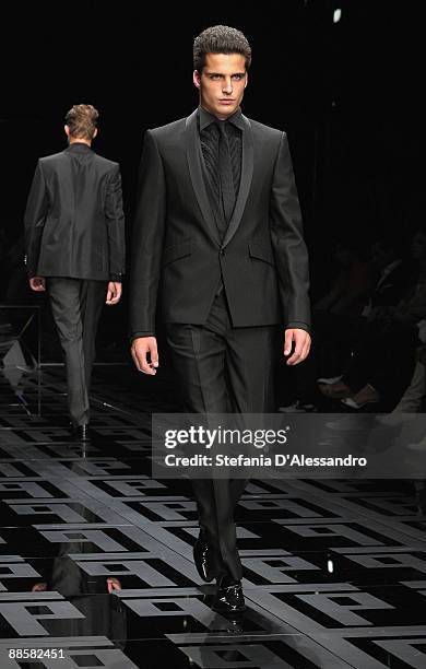 Model walks the runway during Carlo Pignatelli Cerimonia Fashion Show as part as Milan Fashion Week Menswear Spring/Summer 2010 on June 19, 2009 in...