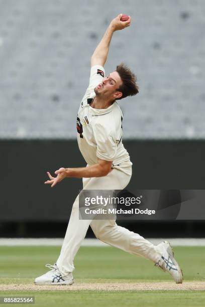 Mitch Marsh of Western Australia bowls during day three of the Sheffield Shield match between Victoria and Western Australia at Melbourne Cricket...