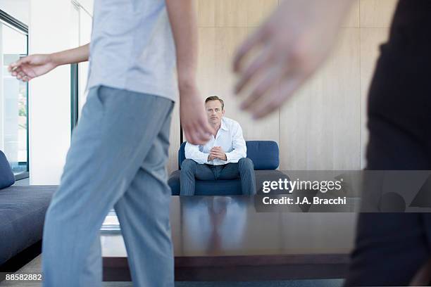 businessman waiting in office reception area - job interview nervous stock pictures, royalty-free photos & images