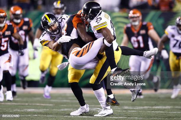 Fort and Artie Burns of the Pittsburgh Steelers tackle A.J. Green of the Cincinnati Bengals during the second half at Paul Brown Stadium on December...