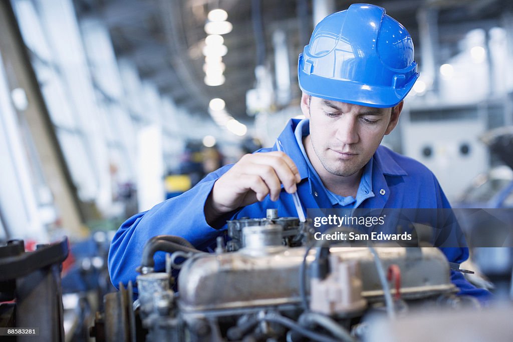 Technician working in auto shop