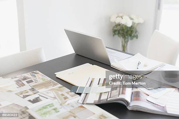 interior design books on table - magazine table stock pictures, royalty-free photos & images