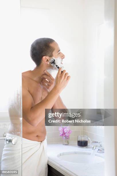 man shaving face - shaving chest stock pictures, royalty-free photos & images