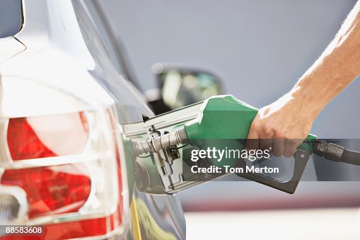 Man pumping gas Man pumping gas