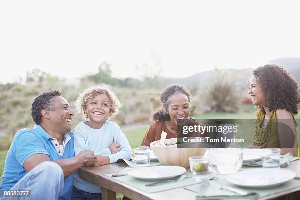 family eating outdoors - indian food bildbanksfoton och bilder