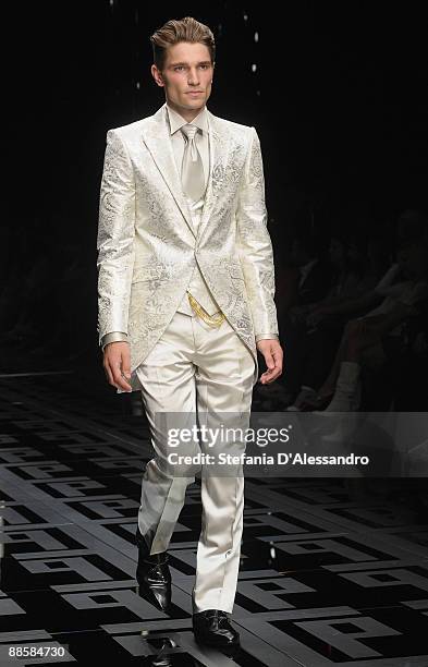 Model walks the runway during Carlo Pignatelli Cerimonia Fashion Show as part as Milan Fashion Week Menswear Spring/Summer 2010 on June 19, 2009 in...