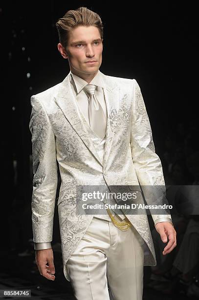 Model walks the runway during Carlo Pignatelli Cerimonia Fashion Show as part as Milan Fashion Week Menswear Spring/Summer 2010 on June 19, 2009 in...