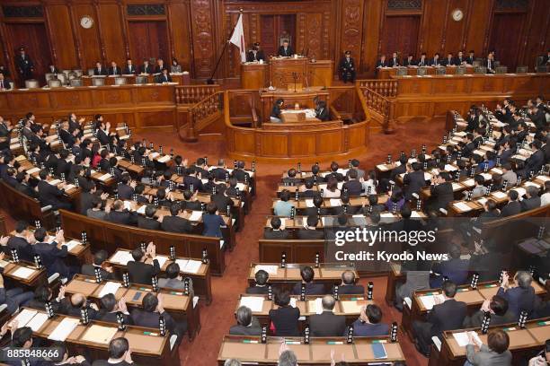 Japan's House of Representatives adopts at a plenary session in Tokyo on Dec. 5, 2017 a resolution condemning North Korea's launch of an...