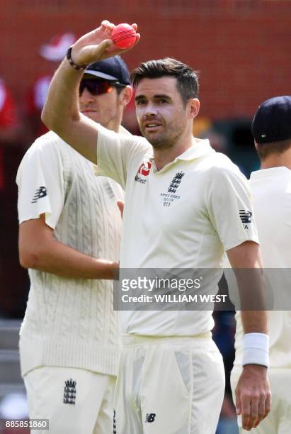 England paceman James Anderson acknowledges the applause after capturing five Australian wickets on the fourth day of the second Ashes cricket Test...