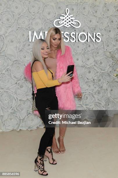 Isabel Bedoya and Melly Sanchez attend Impressions Vanity Melrose Grand Opening Gala on December 4, 2017 in Los Angeles, California.