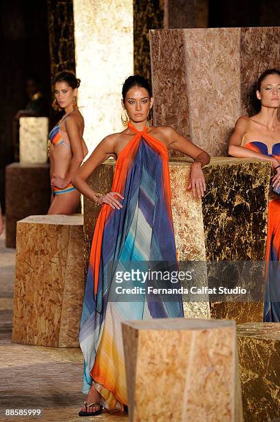 Models display a design by Agua de Coco by Liana Thomaz during the third day of the Sao Paulo Fashion Week Spring - Summer 2010 collection at the...