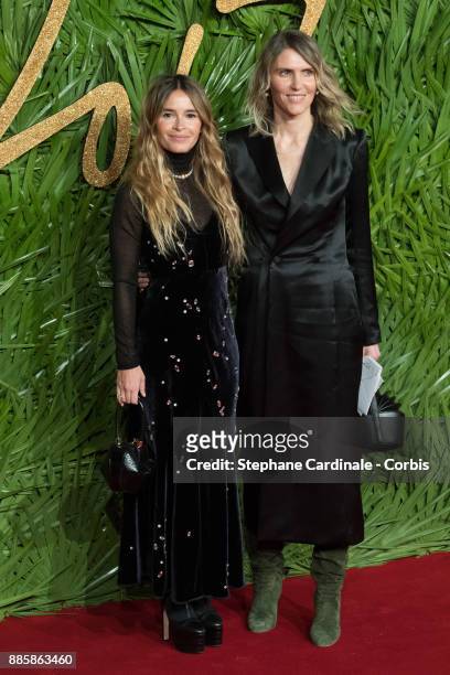Miroslava Duma and a guest attend the Fashion Awards 2017 In Partnership With Swarovski at Royal Albert Hall on December 4, 2017 in London, England.