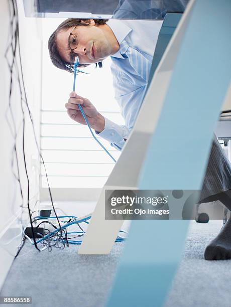 Plugging In Wires Photos and Premium High Res Pictures - Getty Images