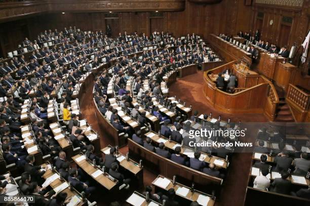 Japan's House of Representatives adopts at a plenary session in Tokyo on Dec. 5, 2017 a resolution condemning North Korea's launch of an...