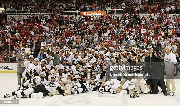 The Pittsburgh Penguins pose with the Stanley Cup following the Penguins victory over the Detroit Red Wings in Game Seven of the 2009 NHL Stanley Cup...