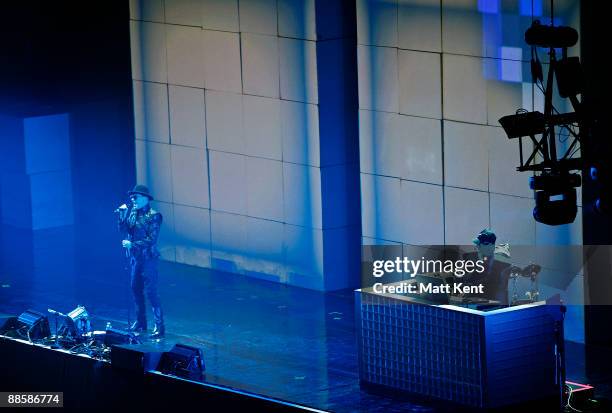 Neil Tennant and Chris Lowe of Pet Shop Boys perform on stage at O2 Arena on June 19, 2009 in London, England.