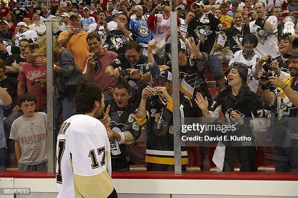 Pittsburgh Penguins Petr Sykora victorious with fans after winning game and series vs Detroit Red Wings. Game 7. Detroit, MI 6/12/2009 CREDIT: David...