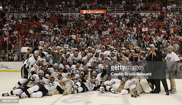 The Pittsburgh Penguins pose with the Stanley Cup following the Penguins victory over the Detroit Red Wings in Game Seven of the 2009 NHL Stanley Cup...