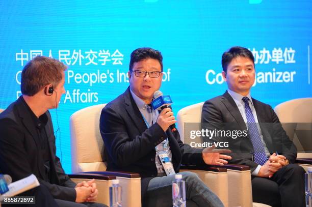 Founder and CEO of NetEase William Ding and Chairman and CEO of JD.com Liu Qiangdong speak during the 4th World Internet Conference on December 4,...