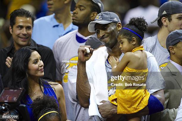 Finals: Los Angeles Lakers Kobe Bryant victorious with wife Vannesa and daughter Gianna Maria-Onore Bryant after winning Game 5 and series vs Orlando...