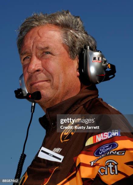 Jimmy Fennig, crew chief for the UPS Ford driven by Davis Ragan looks on during qualifying for the NASCAR Sprint Cup Series Toyota/Save Mart 350 at...