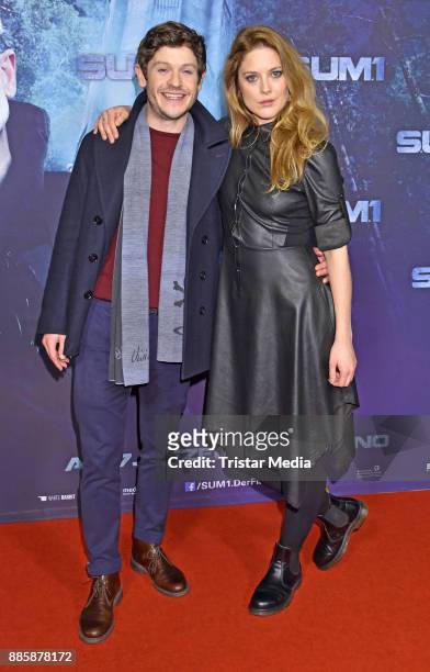Iwan Rheon and Zoe Grisedale attend the 'S.U.M. 1' premiere at CineStar movie theatre on December 4, 2017 in Berlin, Germany.