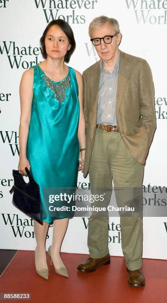 Director Woody Allen and wife Soon-Yi Previn attend the "Whatever Works" Paris premiere at Cinema Gaumont Opera on June 19, 2009 in Paris, France.