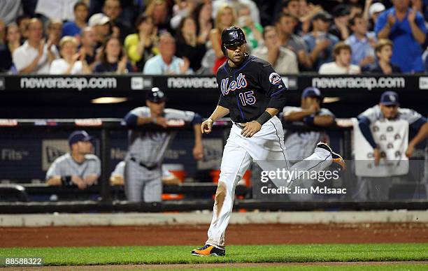 Carlos Beltran of the New York Mets scores a run in the eighth inning against the the Tampa Bay Rays on June 19, 2009 at Citi Field in the Flushing...