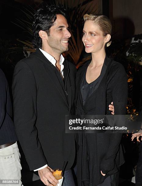 Tato Malzoni and Ana Claudia Michels attend the party of the Yves Saint Laurent fragrance La Nuit de L'Homme on June 20, 2009 in Sao Paulo, Brazil.