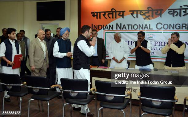 Rahul Gandhi, Manmohan Singh and Sushilkumar Shinde with party leaders during filing of nomination papers for the post of party President, at the...