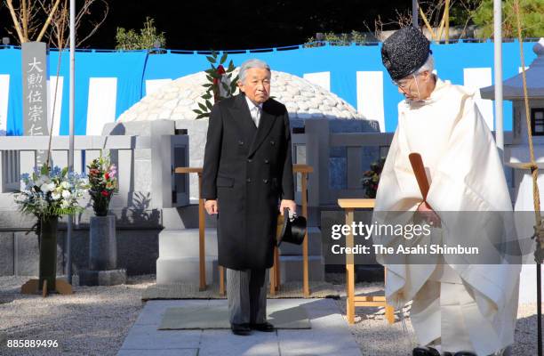 Emperor Akihito prays at an altar at Toshimagaoka Cemetery to pay tribute to late Prince Mikasa on December 5, 2017 in Tokyo, Japan.