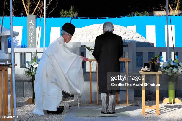 Emperor Akihito prays at an altar at Toshimagaoka Cemetery to pay tribute to late Prince Mikasa on December 5, 2017 in Tokyo, Japan.