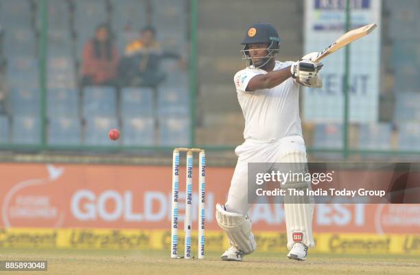 Angelo Mathews of Sri Lanka plays a shot during the 3rd test match between India and Sri Lanka at Ferozshah Kotla Stadium in New Delhi.