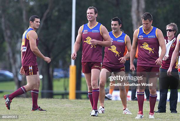 Wayne Carey of the Lions warms up prior to the QAFL Pineapple Hotel Cup Division Two match between the Palm Beach-Currumbin Lions and the...