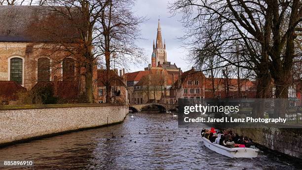 canal view of picturesque medieval bruges, belgium - canal disney stock pictures, royalty-free photos & images