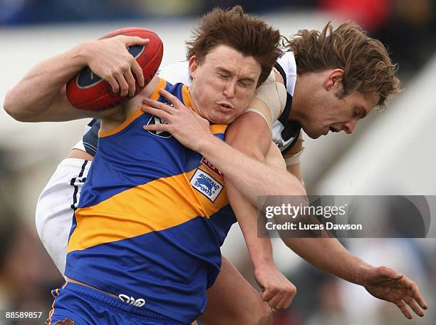 Tom Williams of Williamstown takes a mark during the round 10 VFL match between the Williamstown Seagulls and the Geelong Cats at Burbank Oval on...