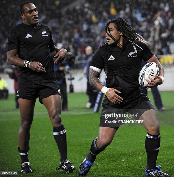 New Zealand's midfield back Ma�a Nonu reacts in front New Zealand's winger Josevata Rokocoko after scoring a try during their rugby union Test match...