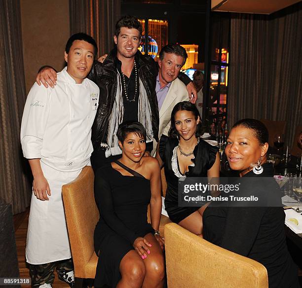 Chef Akira Back, Robin Thicke, Alan Thicke, Paula Patton and Queen Latifah attend Yellowtail restaurant at the Bellagio Las Vegas on June 19, 2009 in...