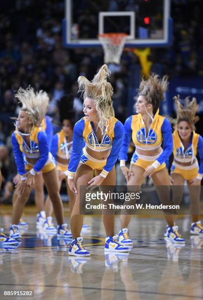 The Golden State Warriors Dance Team performs during an NBA basketball game against the Sacramento Kings at ORACLE Arena on November 27, 2017 in...
