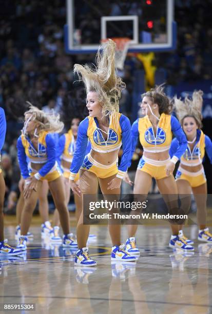 The Golden State Warriors Dance Team performs during an NBA basketball game against the Sacramento Kings at ORACLE Arena on November 27, 2017 in...