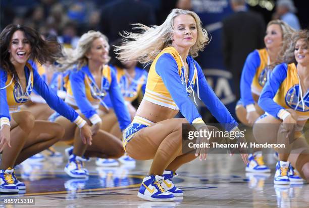 The Golden State Warriors Dance Team performs during an NBA basketball game against the Sacramento Kings at ORACLE Arena on November 27, 2017 in...