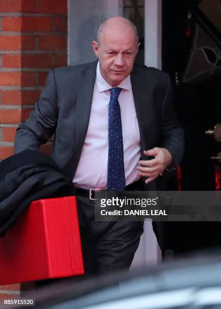 Britain's First Secretary of State Damian Green leaves his home in London on December 5, 2017. - Britian's Prime Minister Theresa May's government...