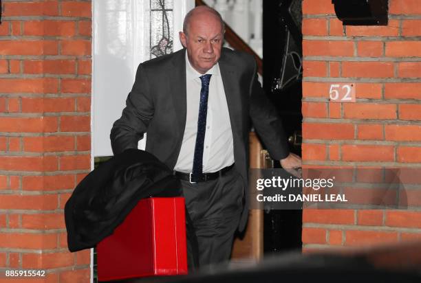 Britain's First Secretary of State Damian Green leaves his home in London on December 5, 2017. - Britian's Prime Minister Theresa May's government...