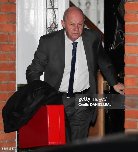 Britain's First Secretary of State Damian Green leaves his home in London on December 5, 2017. - Britian's Prime Minister Theresa May's government...