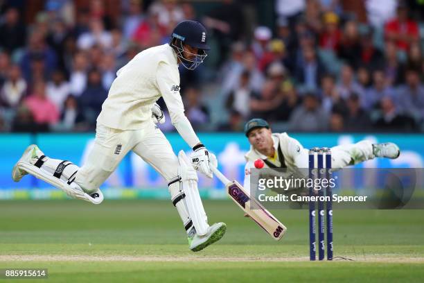 James Vince of England avoids a runout attempt by David Warner of Australia during day four of the Second Test match during the 2017/18 Ashes Series...