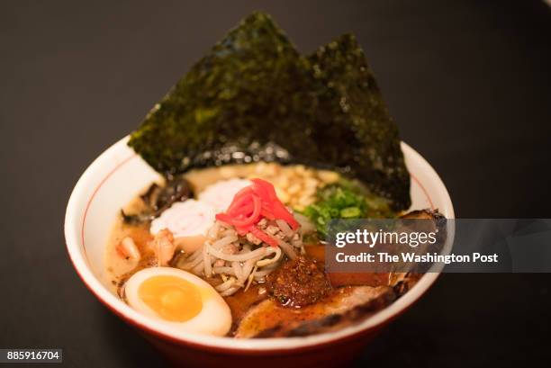 Akira Volcano Ramen - Tonkotsu salt flavor with chashu & stir fried bean sprout, onion with pork, egg, fish cake, corn, scallion, bamboo shoot, wood...